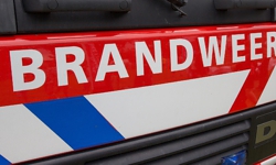 Brand bij Van Greunsvenpark: kledingcontainer in vlammen op